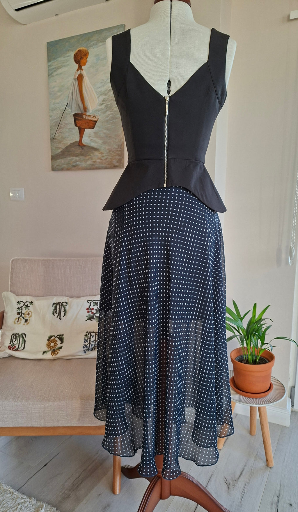 Peplum top with back zip