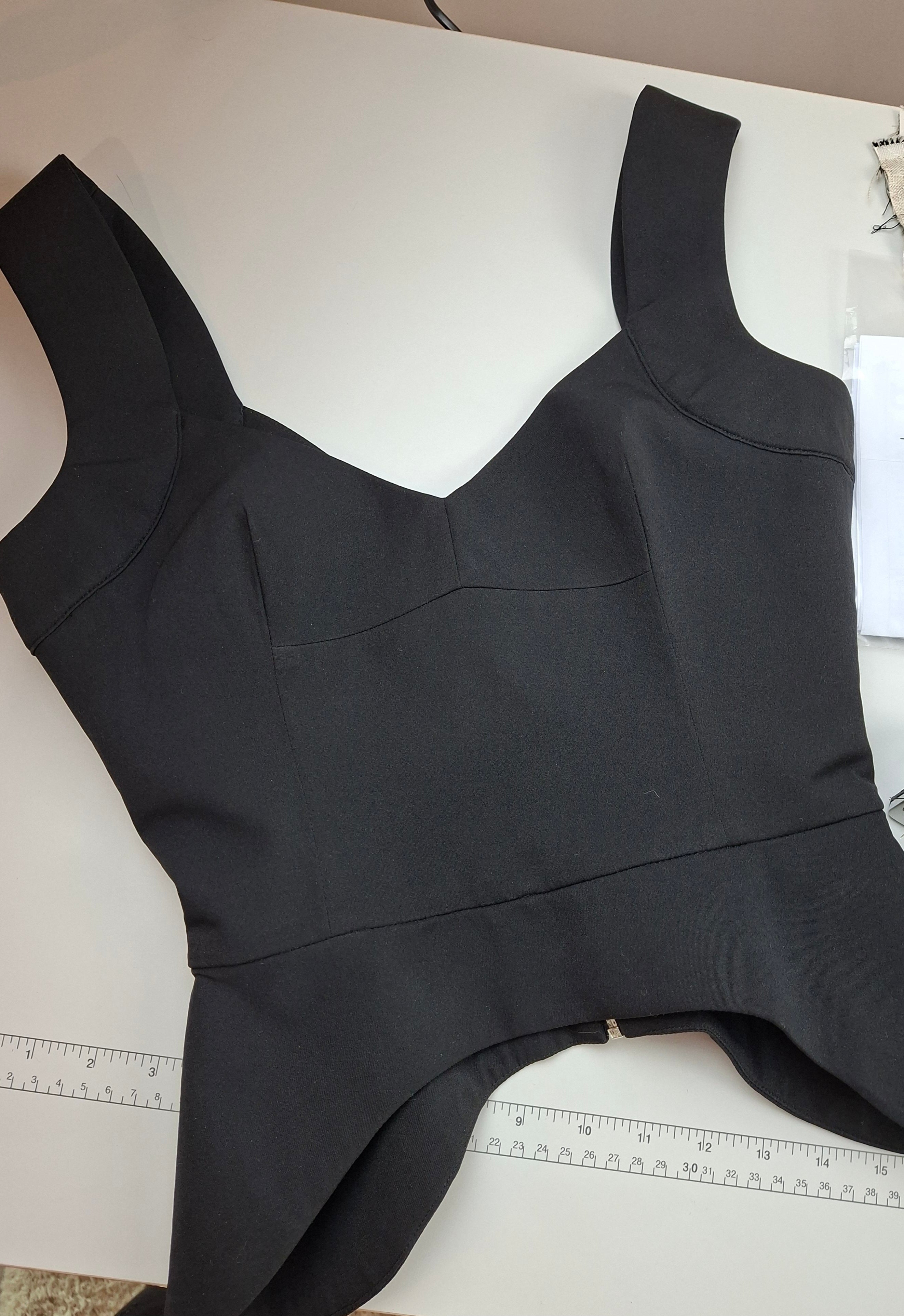 Peplum top with back zip
